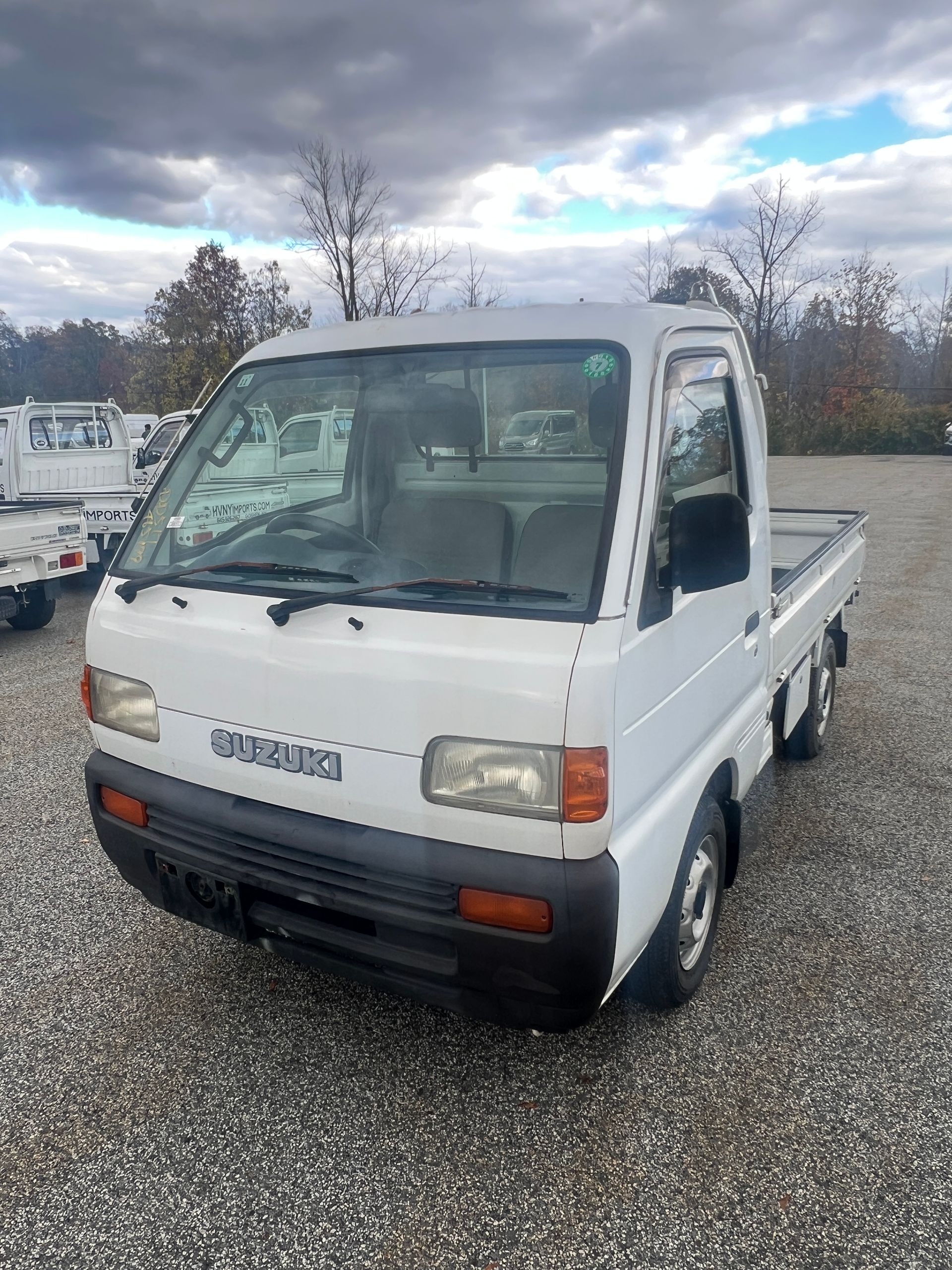 1995 Suzuki Carry Kei Truck 4WD For Sale In a Parking Lot