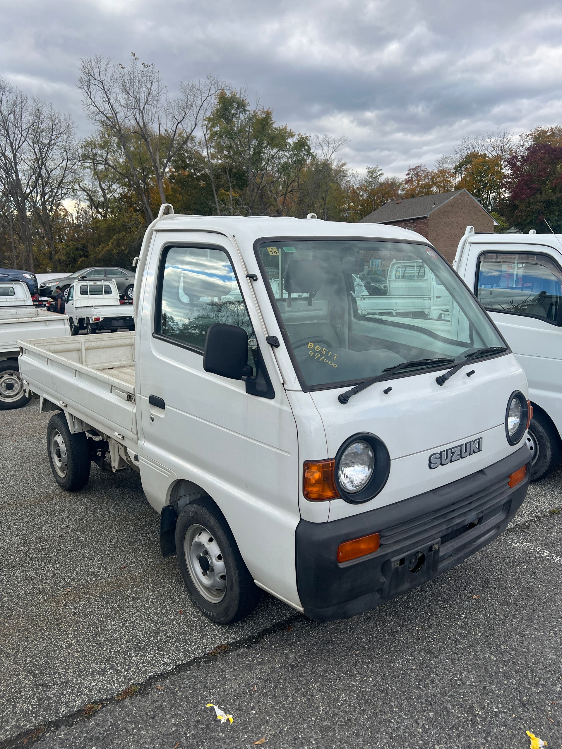 1996 Suzuki Carry Kei Truck 4WD For Sale In a Parking Lot