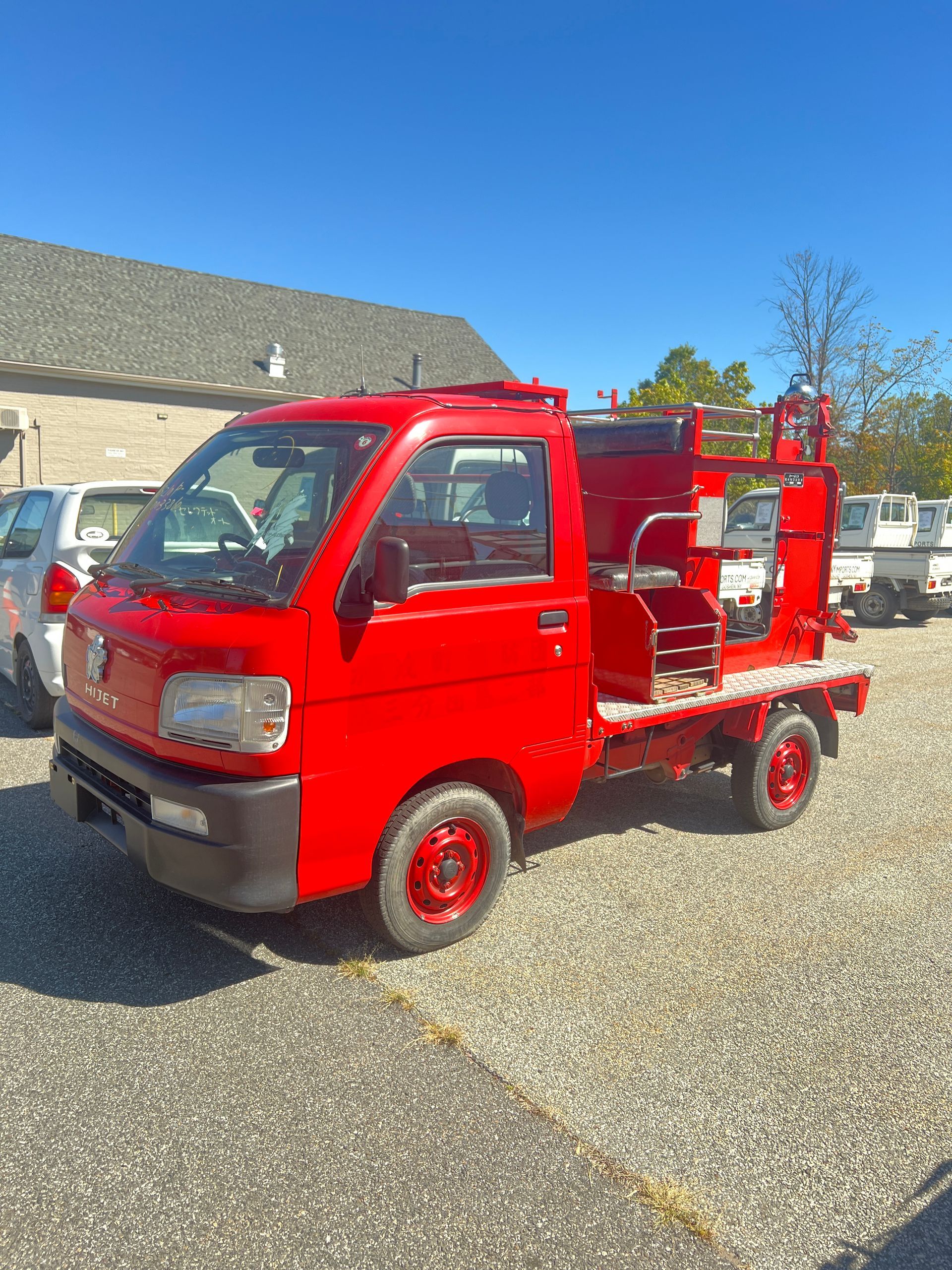 A kei truck for sale A kei truck for sale 1999 Daihatsu Hijet Fire Truck for sale in a parking lot