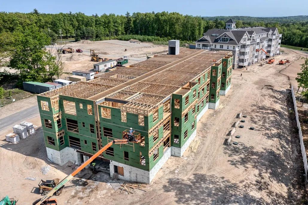 An aerial view of a large building under construction.