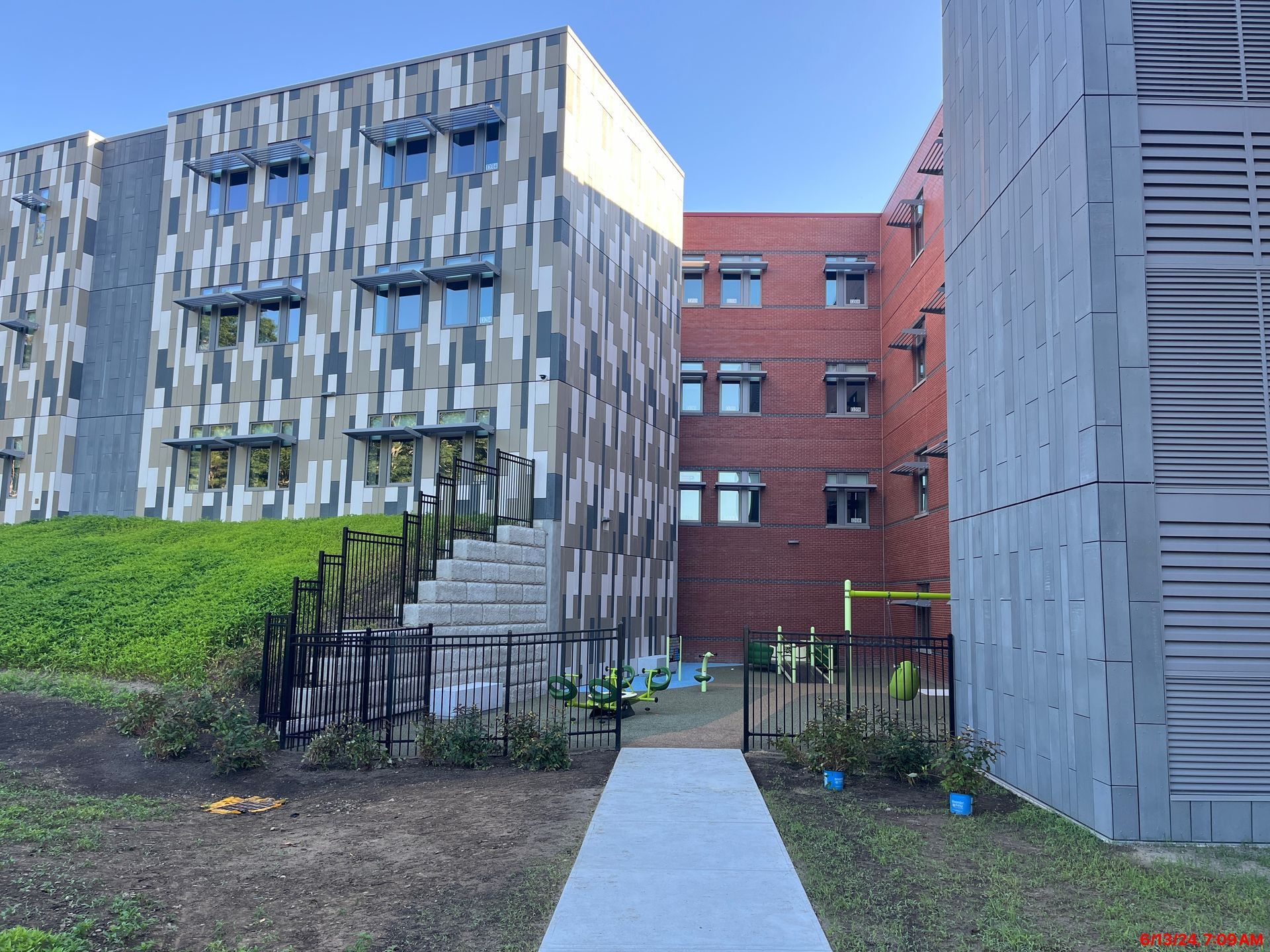 A large building with stairs leading up to it