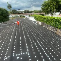 A roof with a lot of white dots on it.