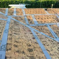 A roof with a lot of tape on it.