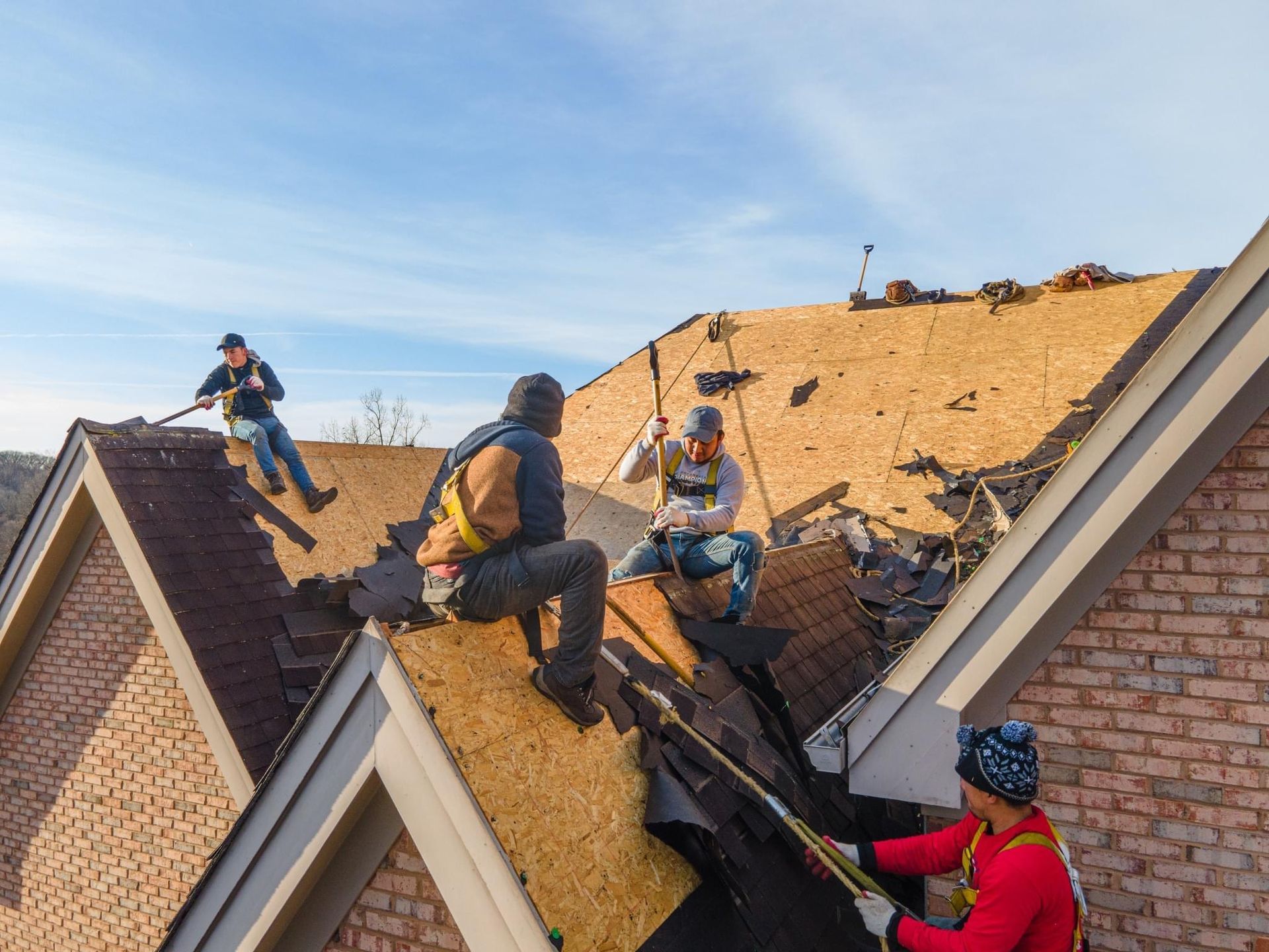 Contractors installing roof