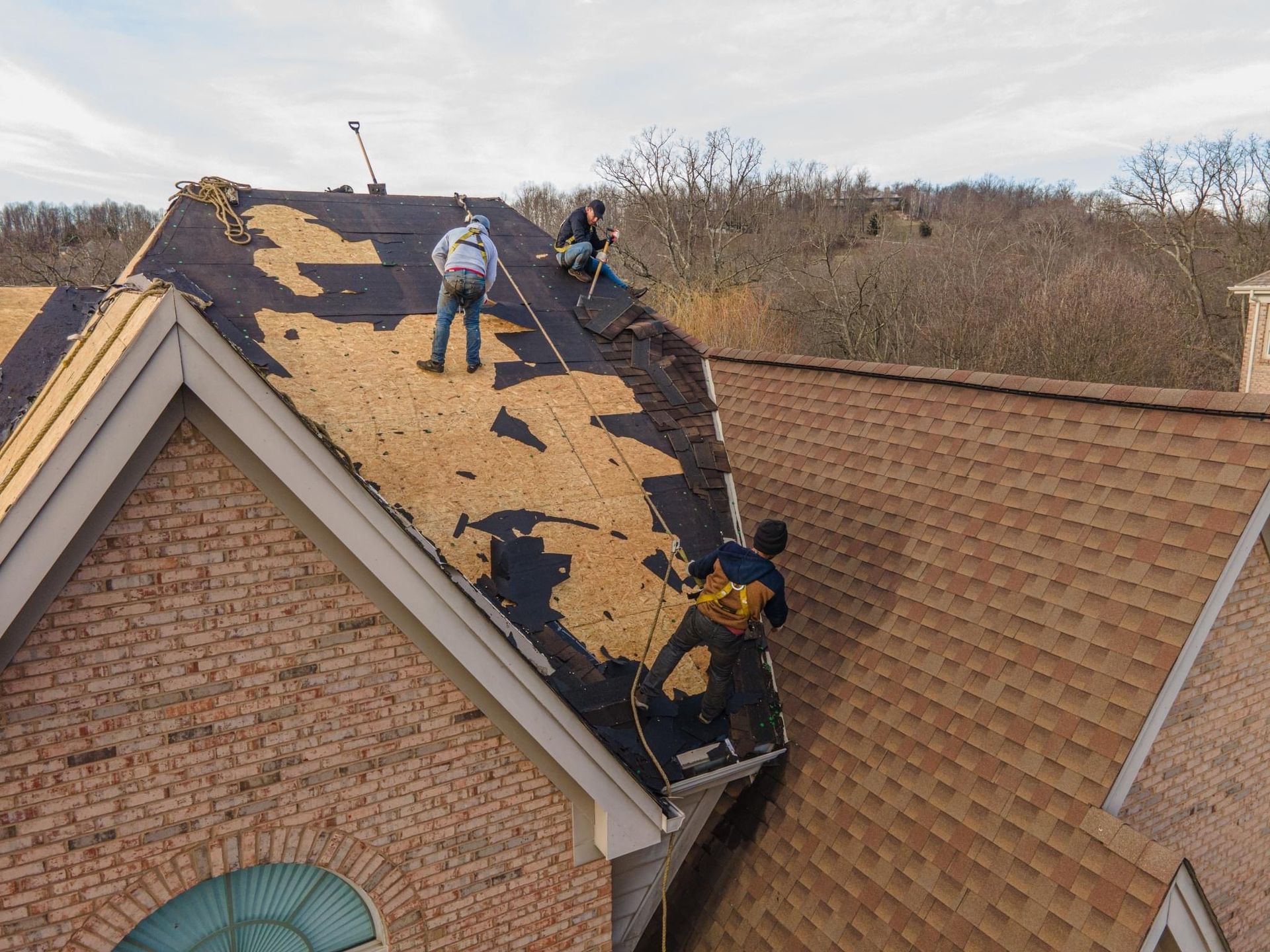 Contractors on the roof working