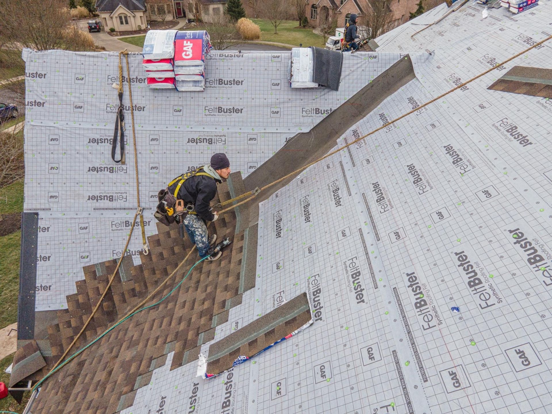 Workers installing roof