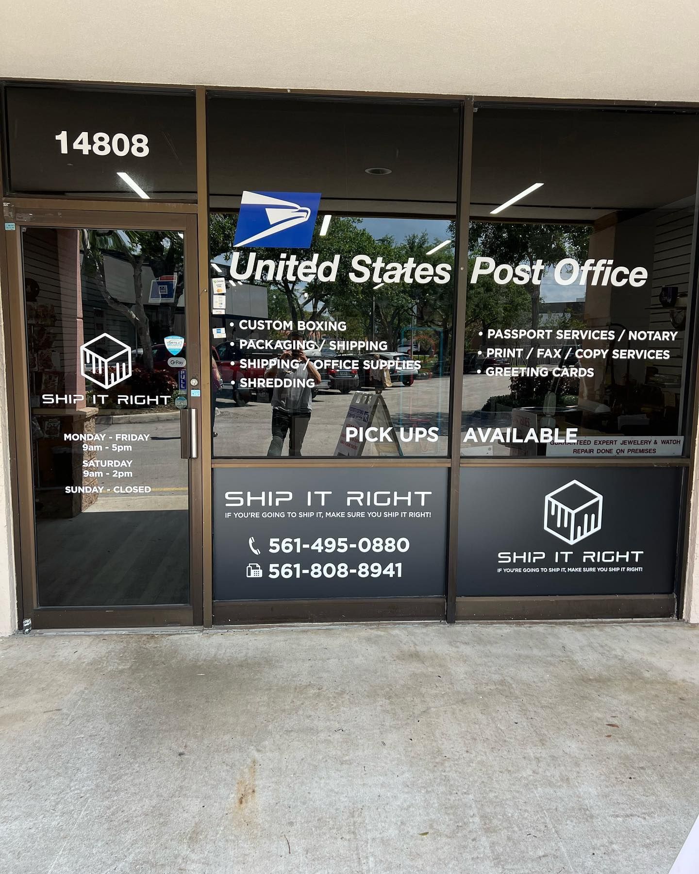 Storefront of Ship It Right, an authorized United States Post Office location, featuring business contact information.