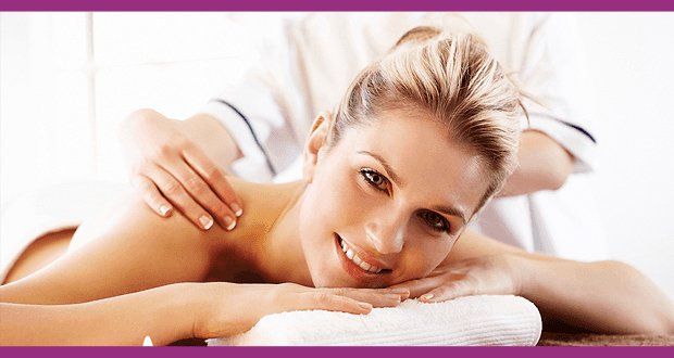 Happy and relax woman availing therapeutic massage