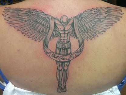 Man with wings tattoo