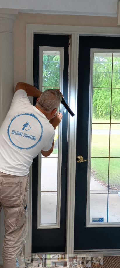 Technician installing a glass door