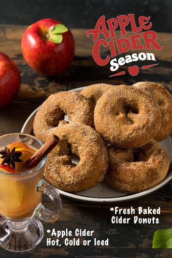 Apple cider season poster with fresh baked cider donuts, apple cider, apples, and star anise on a dark background