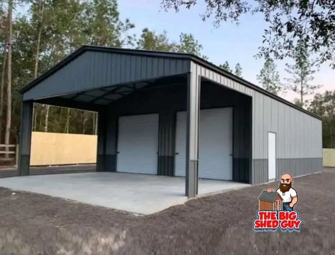 Gray metal building with carport, two garage doors, and a side door.