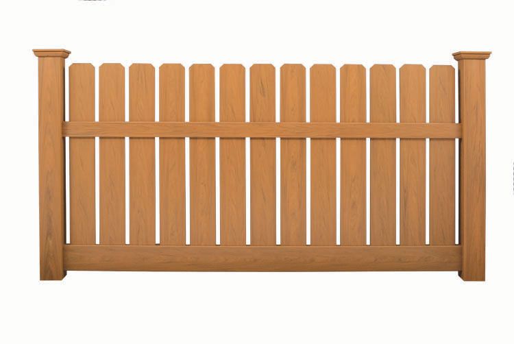 Wooden picket fence panel with vertical slats and tan finish