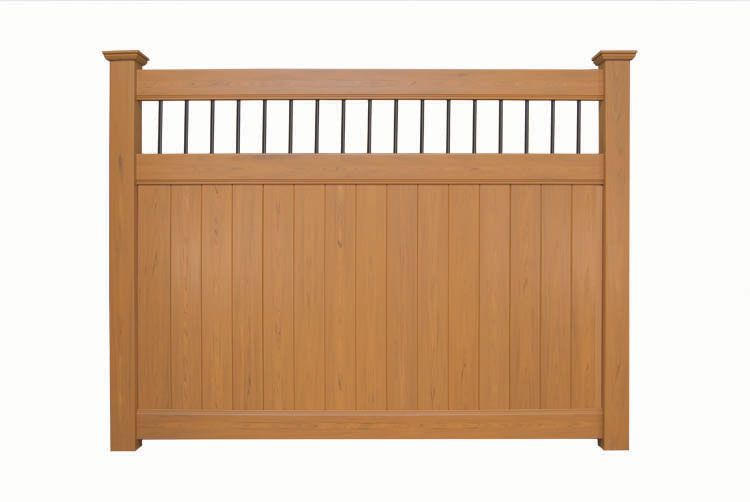 Wooden garden fence panel with vertical slats and brown posts