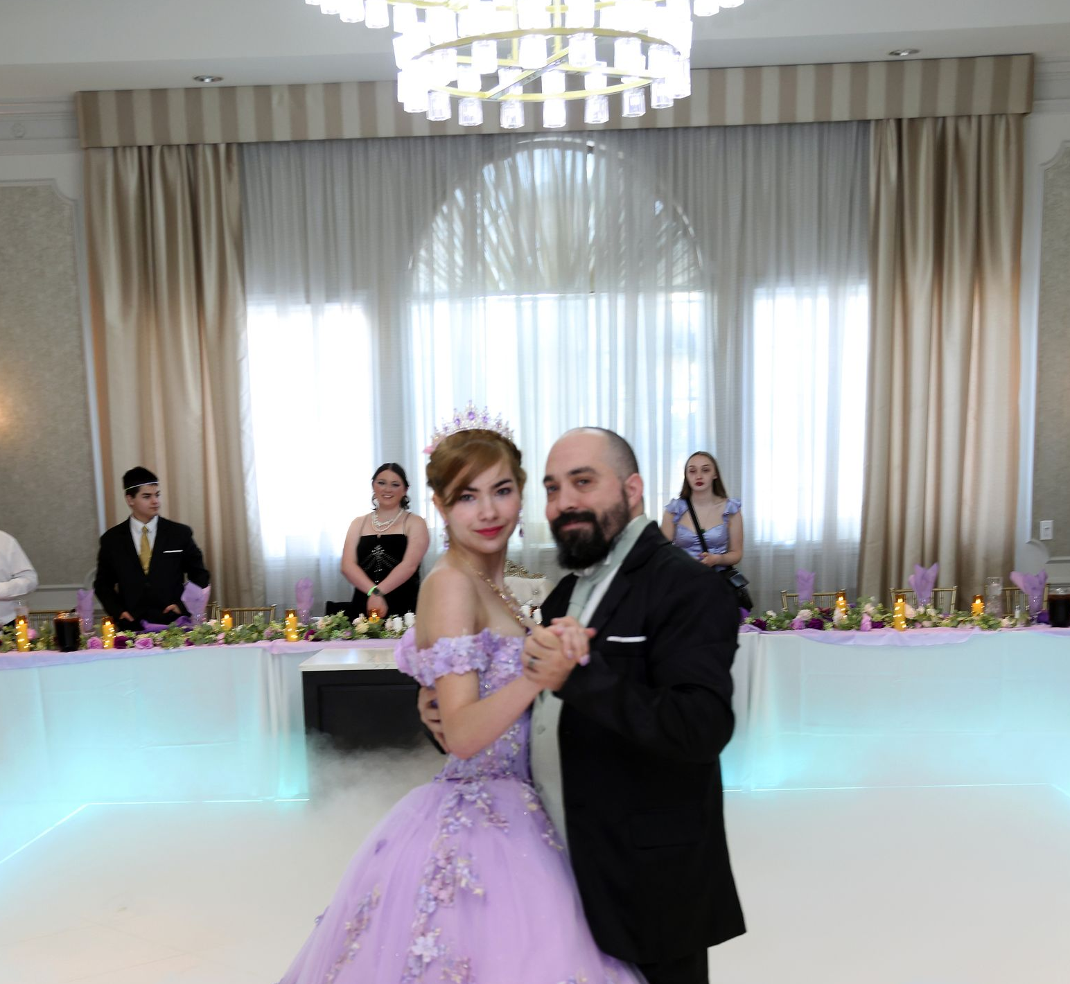 Sweet 16 girl in lavender ball gown, father-daughter dance.