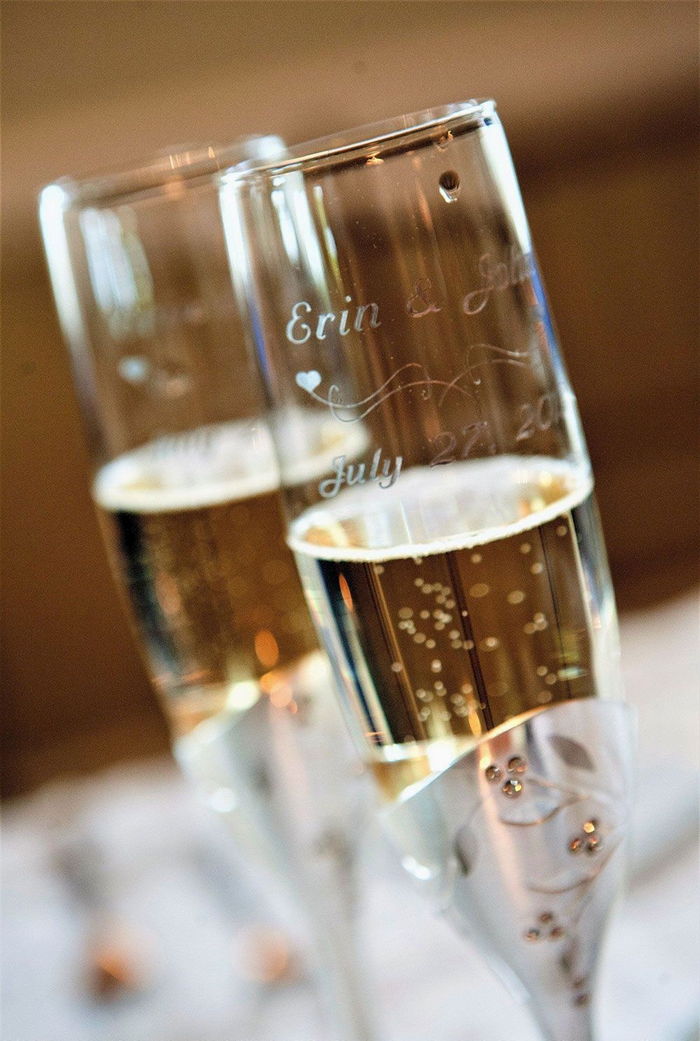 Two champagne flutes with etched inscription 