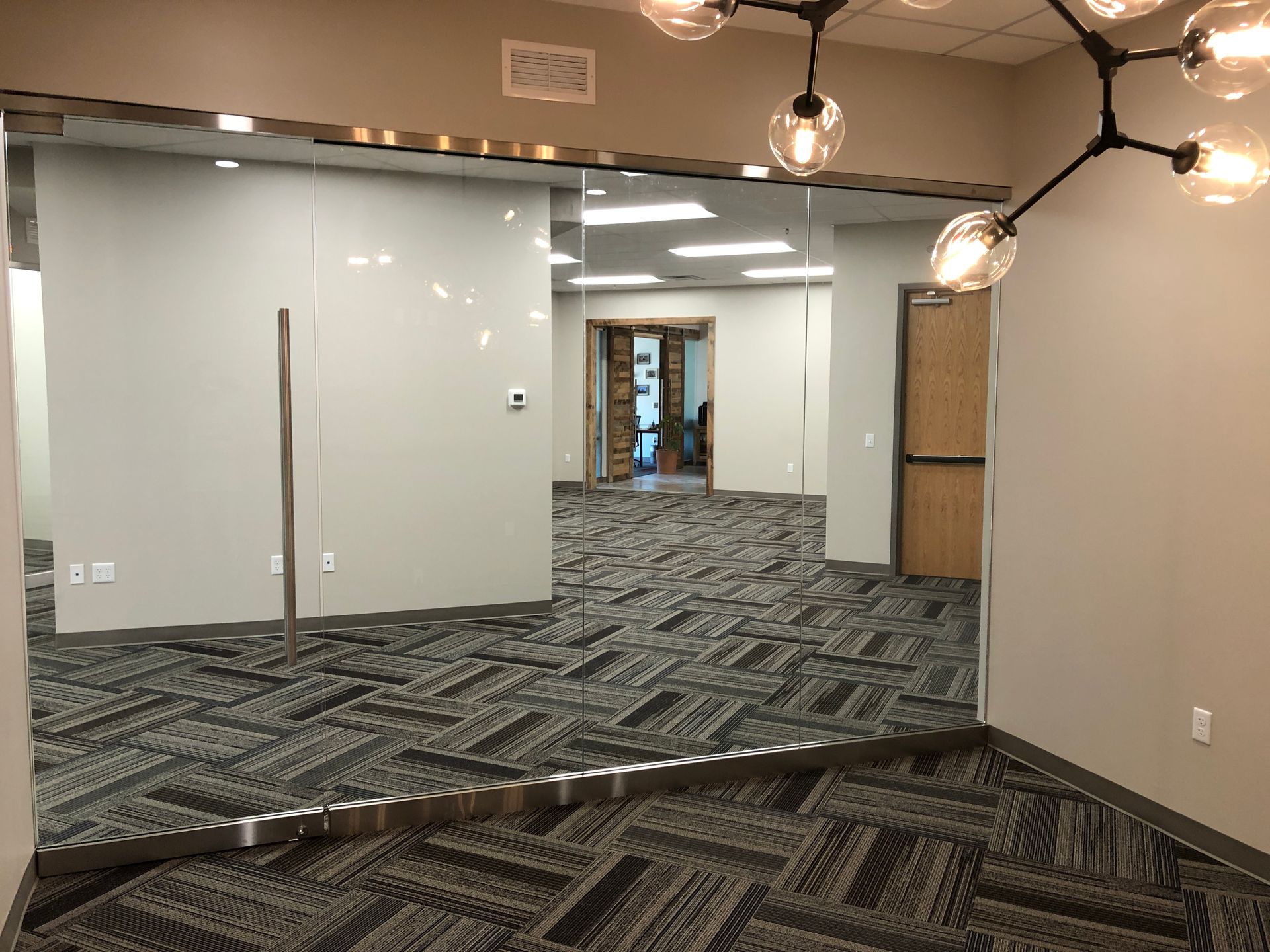 There is a large mirror in the middle of the room.