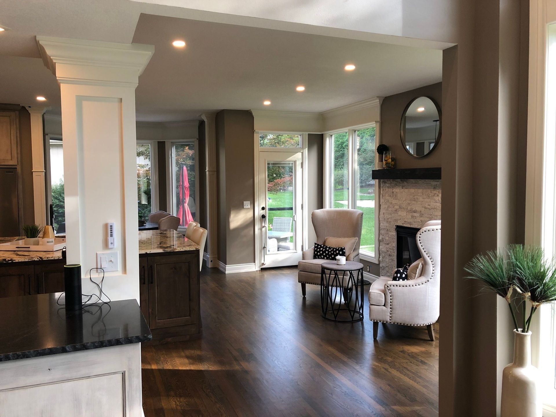 A living room filled with furniture and a fireplace.