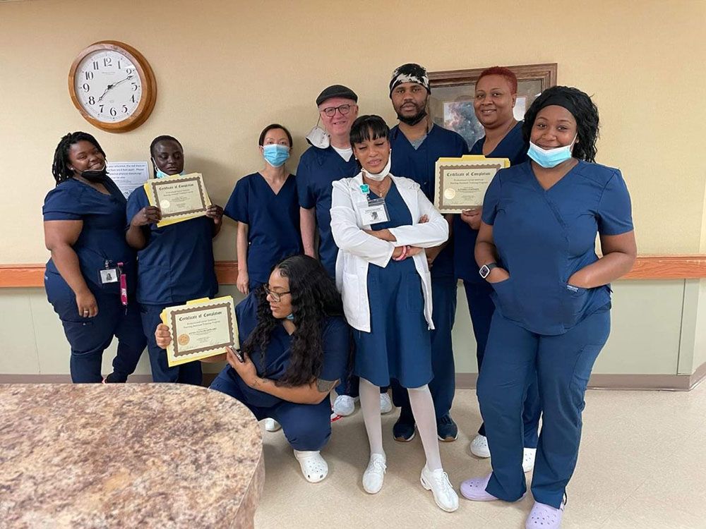 Health Professional Trainees with their Professional Healthcare Instructor - group photo