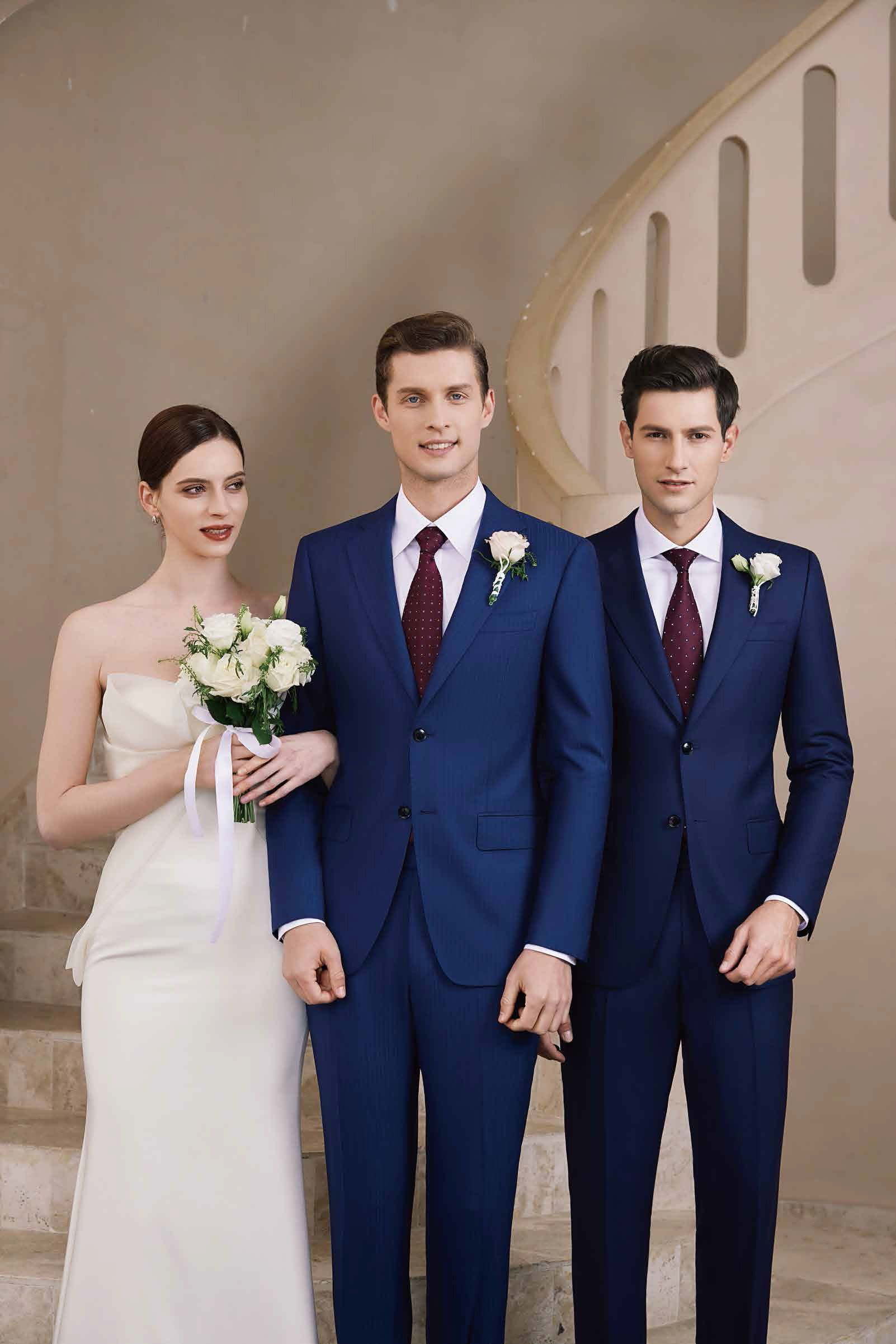 A bride and her groomsmen are standing next to each other on a set of stairs.