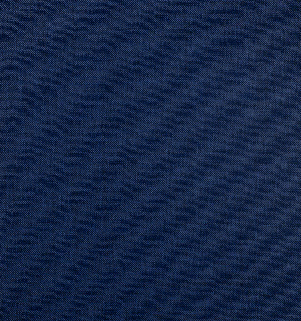 A close up of a mid blue fabric texture