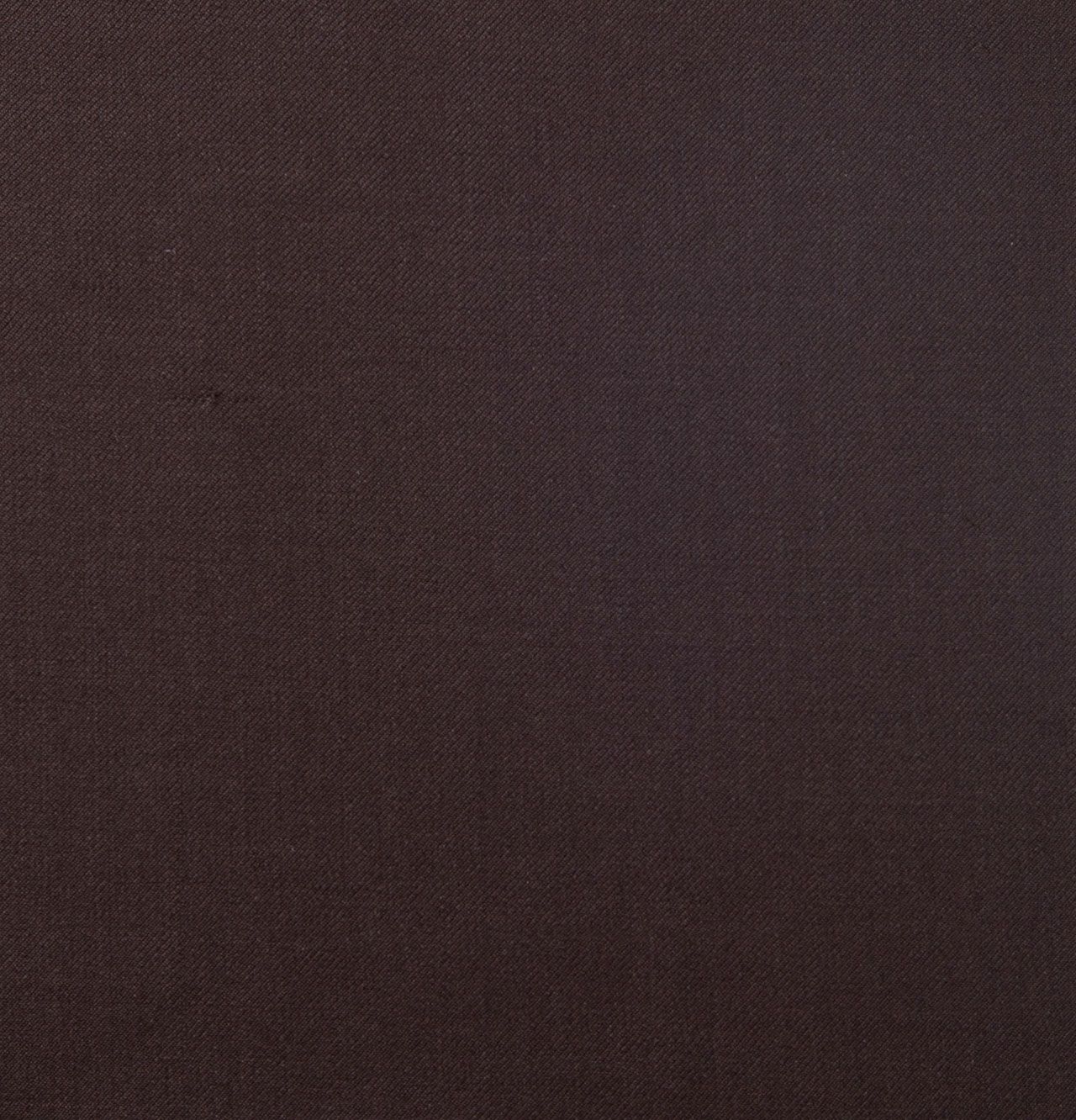 A close up of a dark brown leather texture