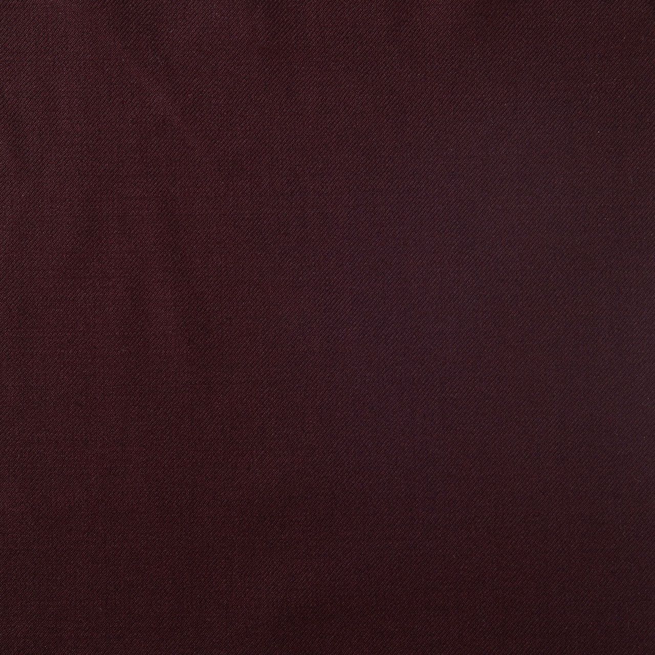A close up of a dark burgundy fabric texture