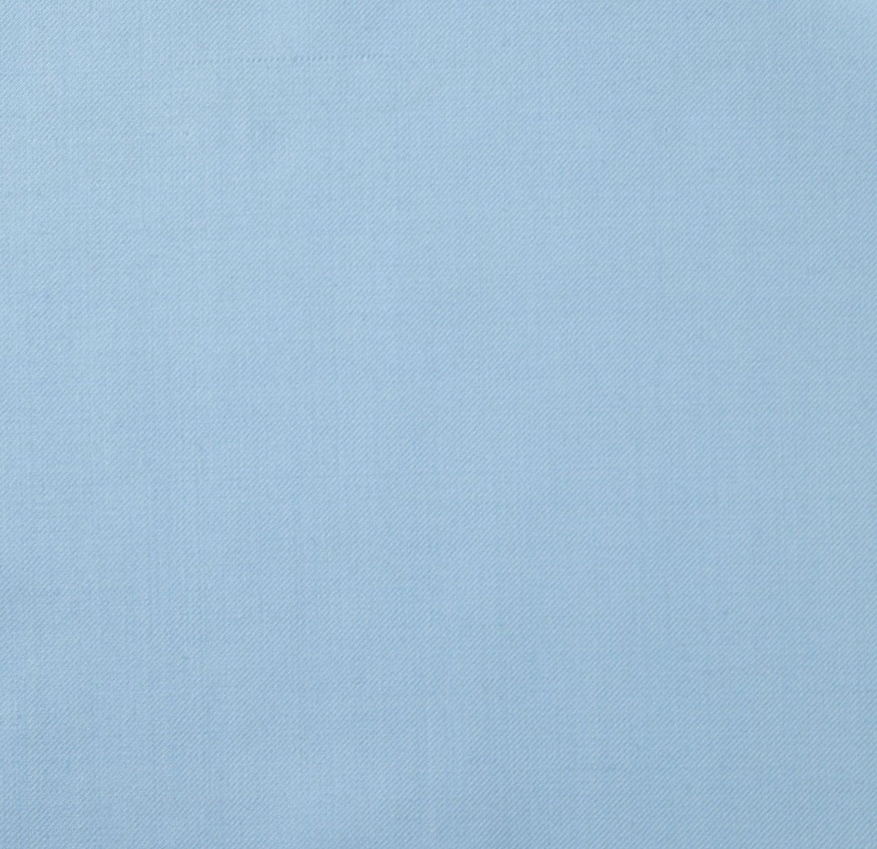 A close up of a light blue fabric texture