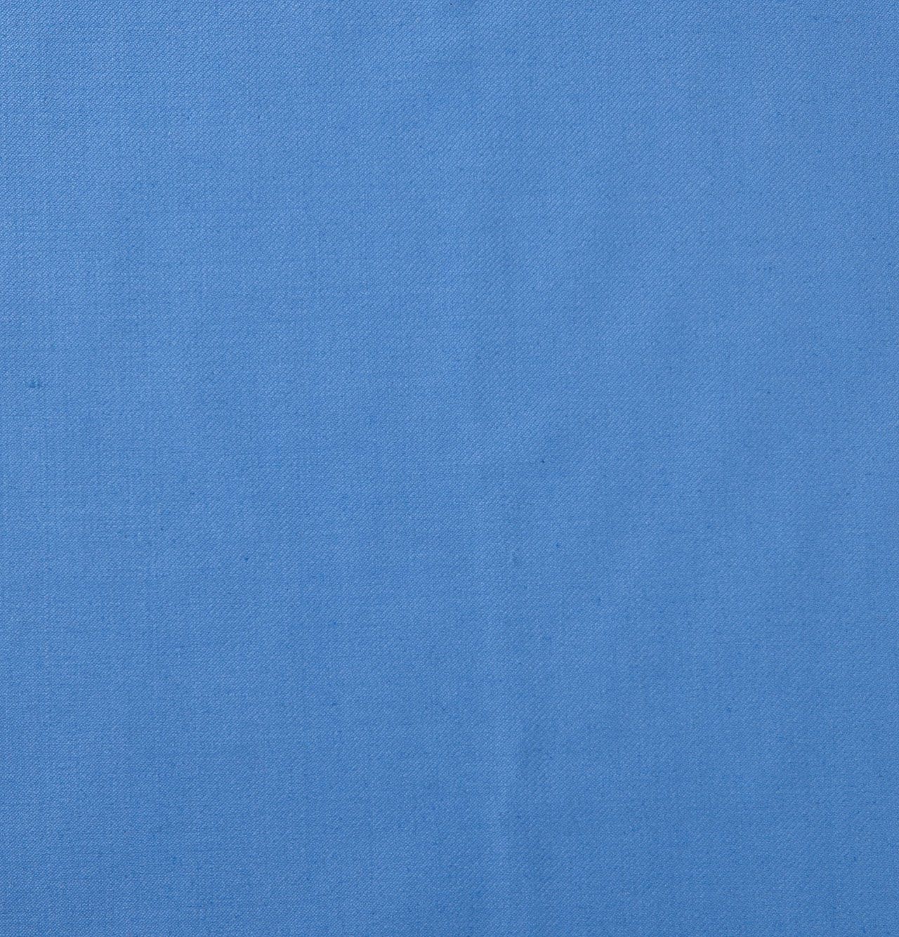 A close up of a sky blue fabric texture