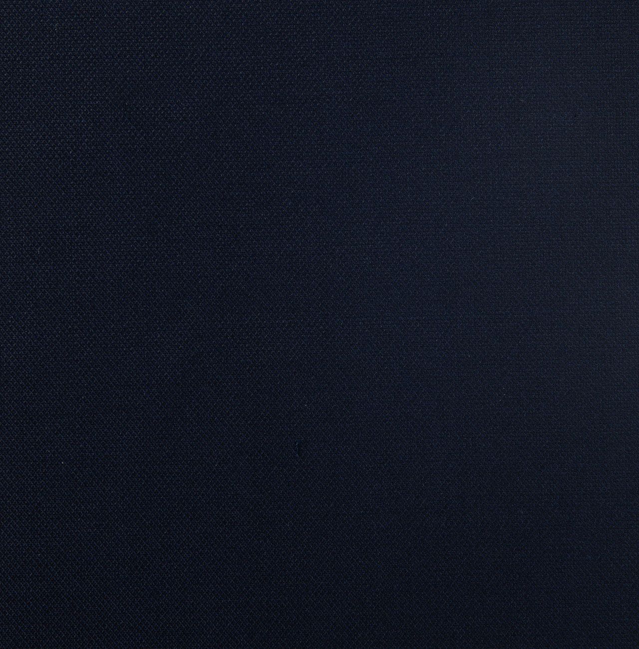 A close up of a dark navy fabric texture