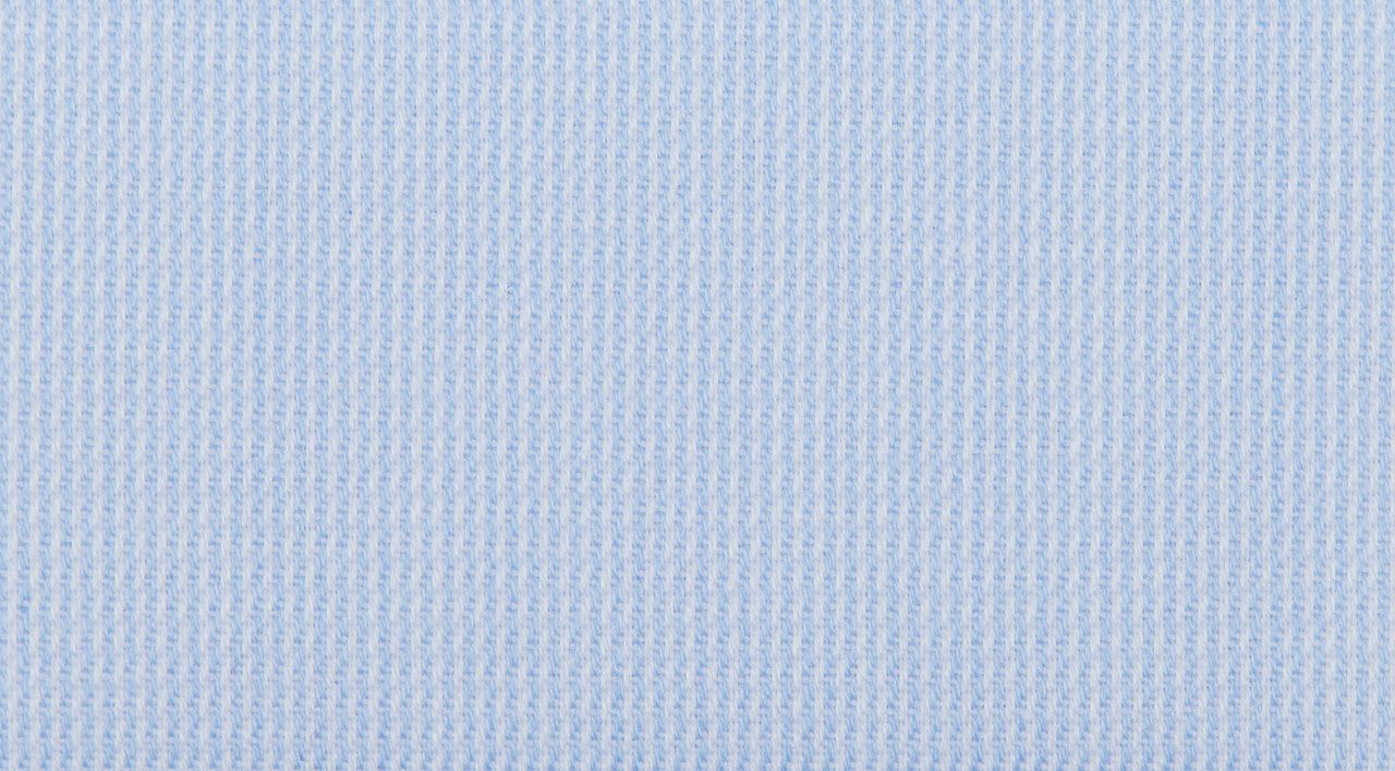A close up of a light blue fabric texture