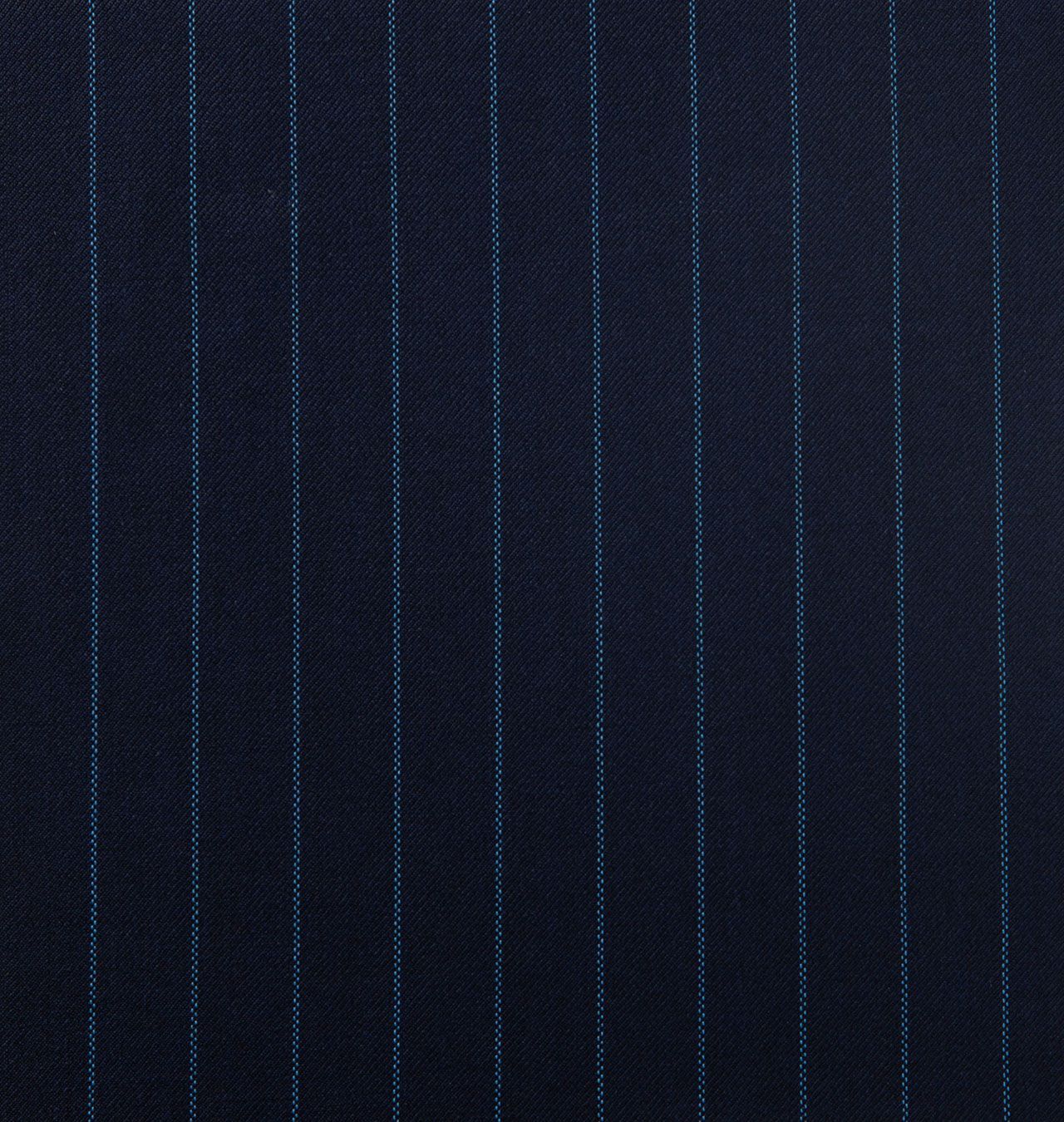 A close up of a blue suit fabric with white stripes