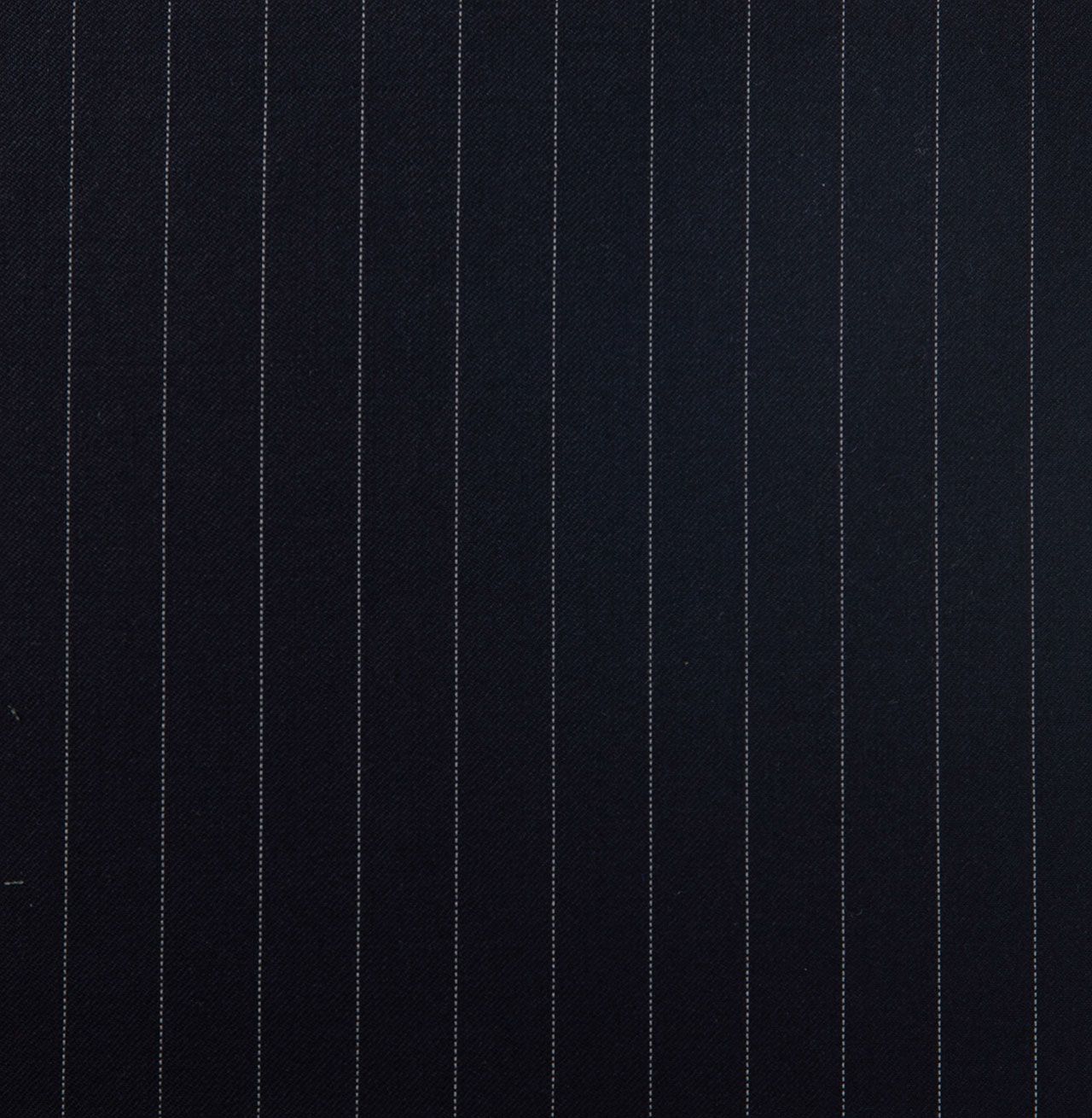 A close up of a dark navy striped fabric with white stripes