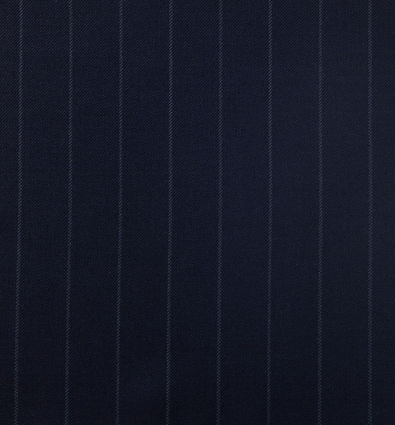 A close up of a navy blue striped suit fabric