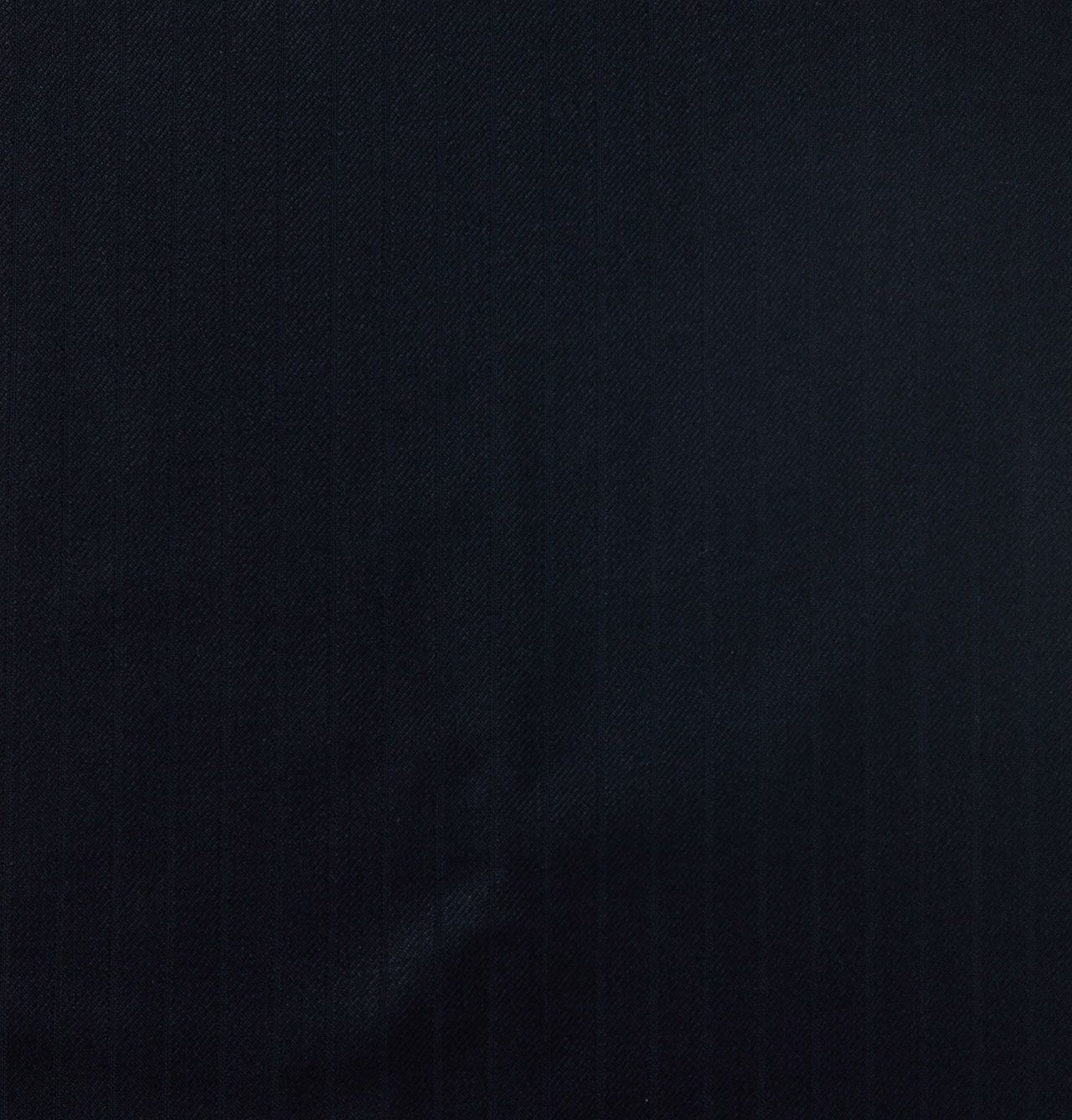 A close up of a black leather texture.