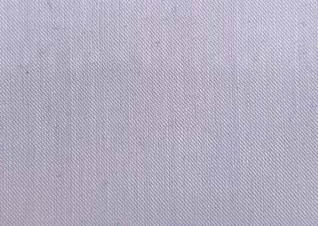 A close up of a white fabric texture