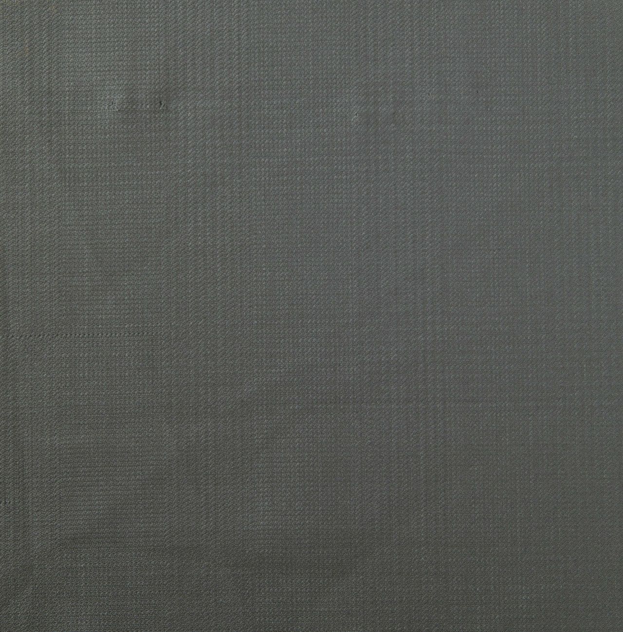 A close up of a grass green fabric texture