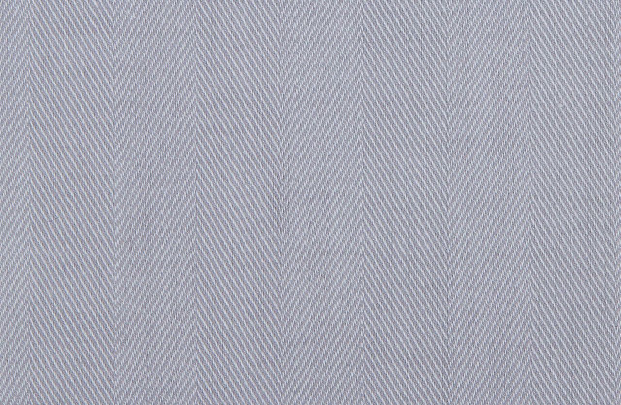 A close up of a white fabric with a herringbone pattern