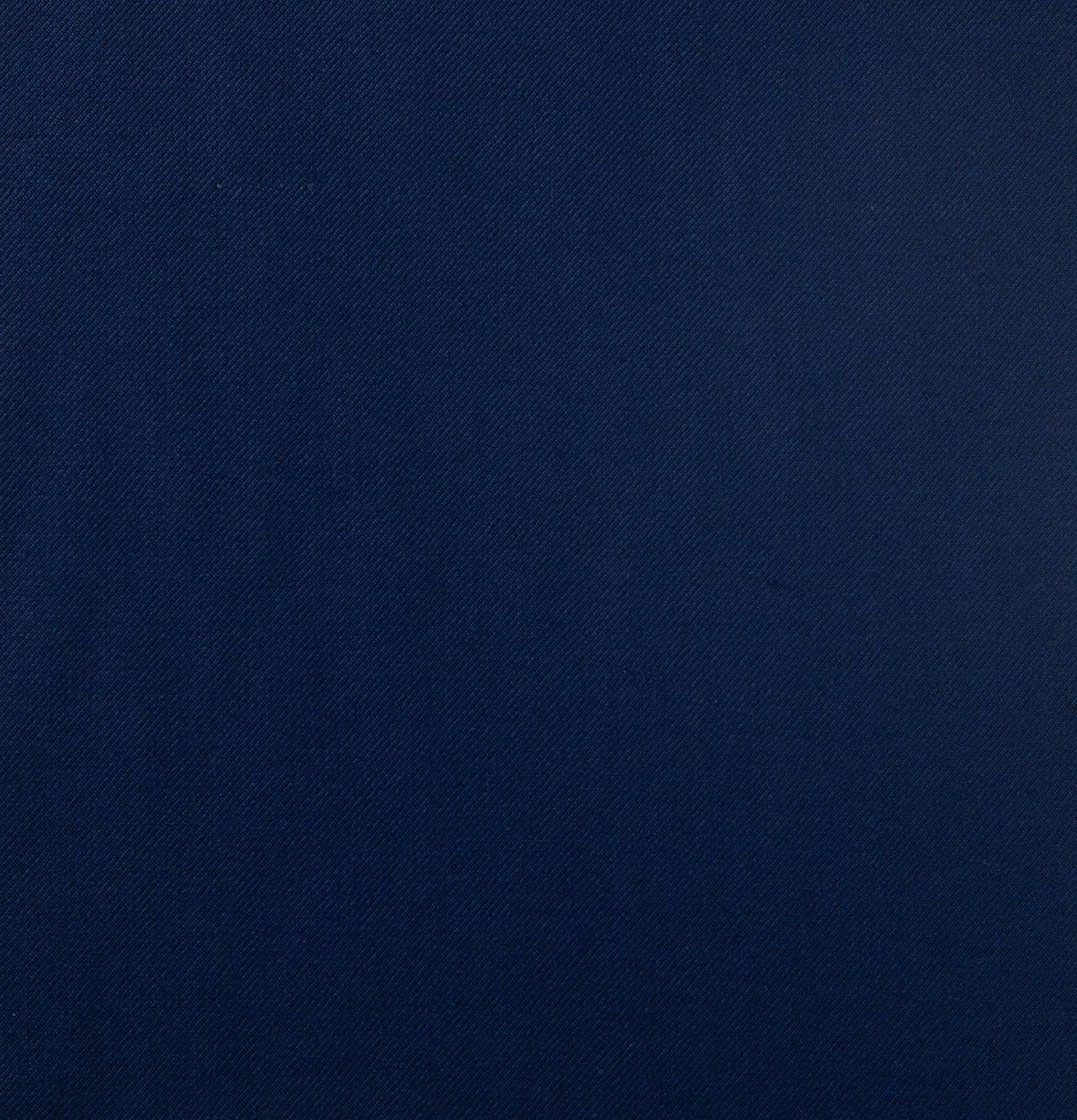 A close up of a navy blue fabric texture