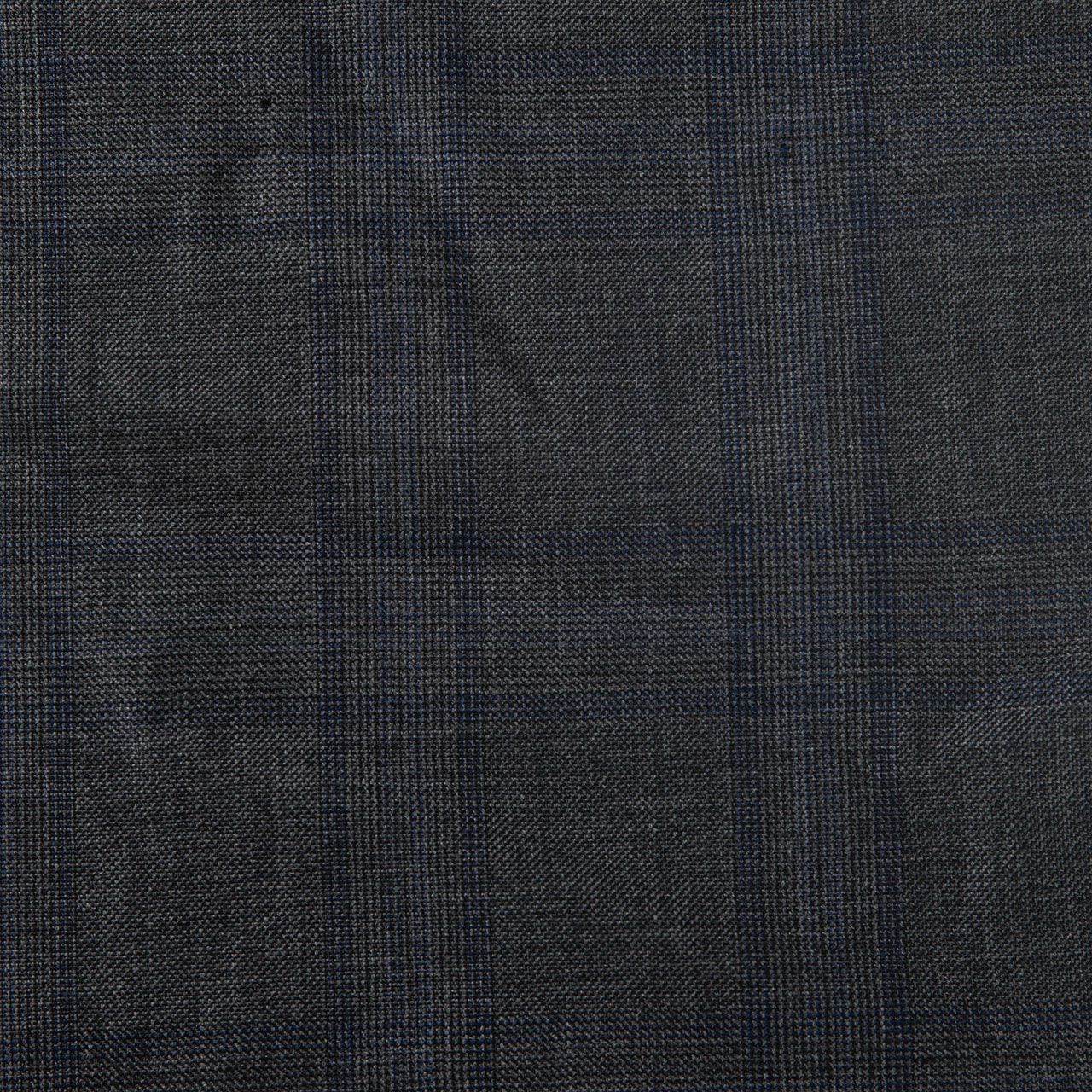 A close up of a dark gray fabric texture