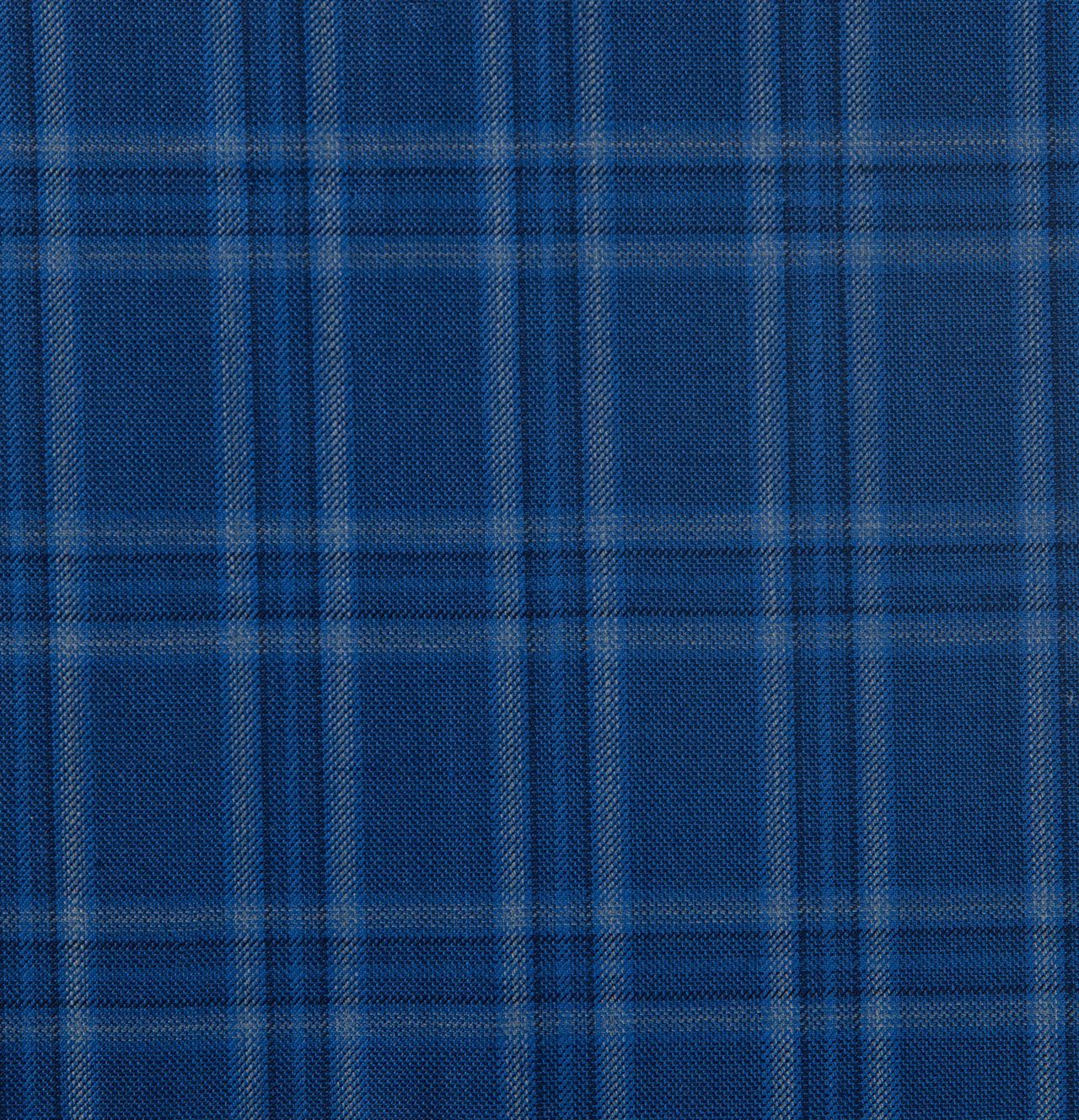 A close up of a blue plaid fabric texture
