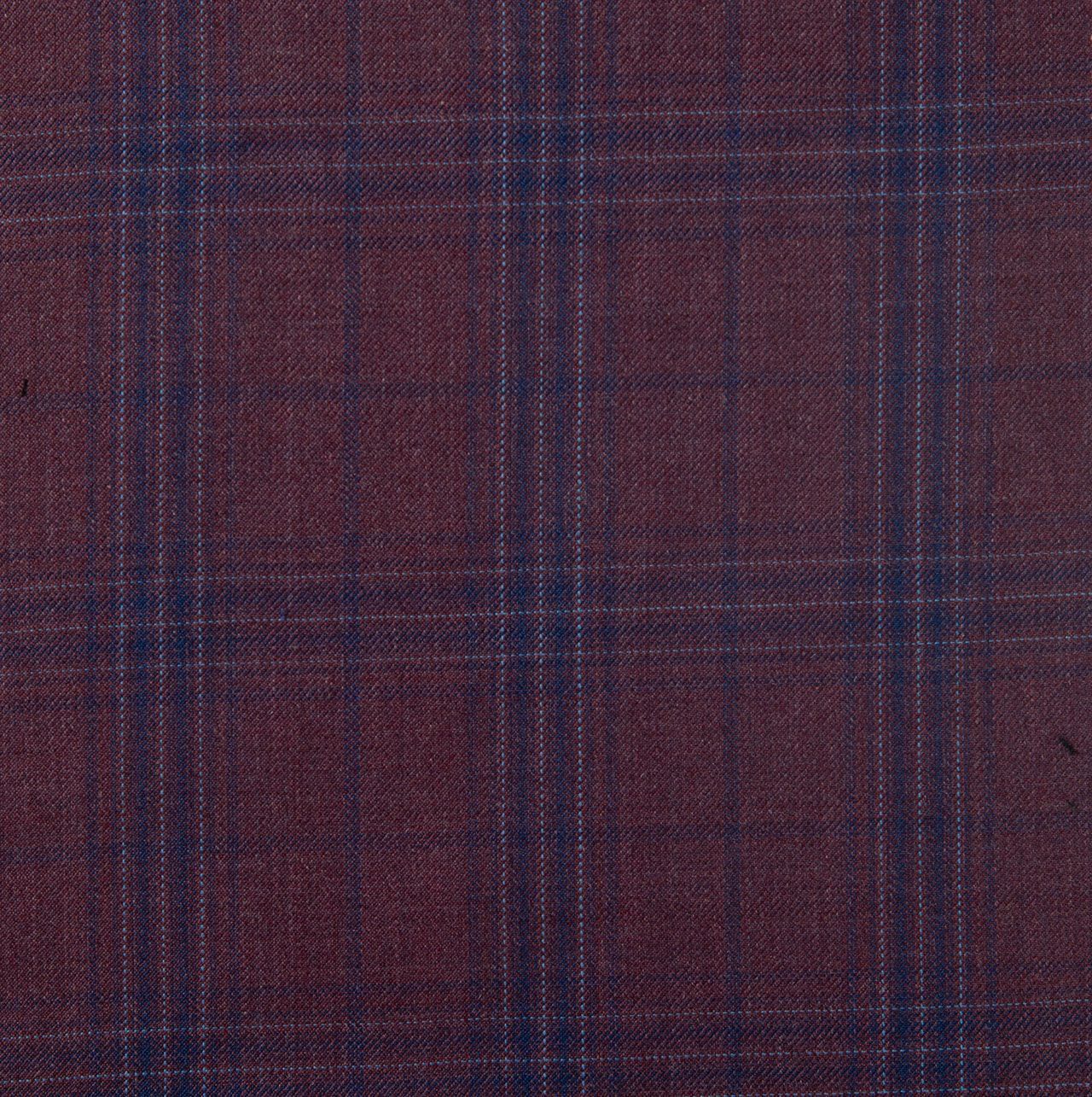 A close up of a maroon and blue plaid fabric