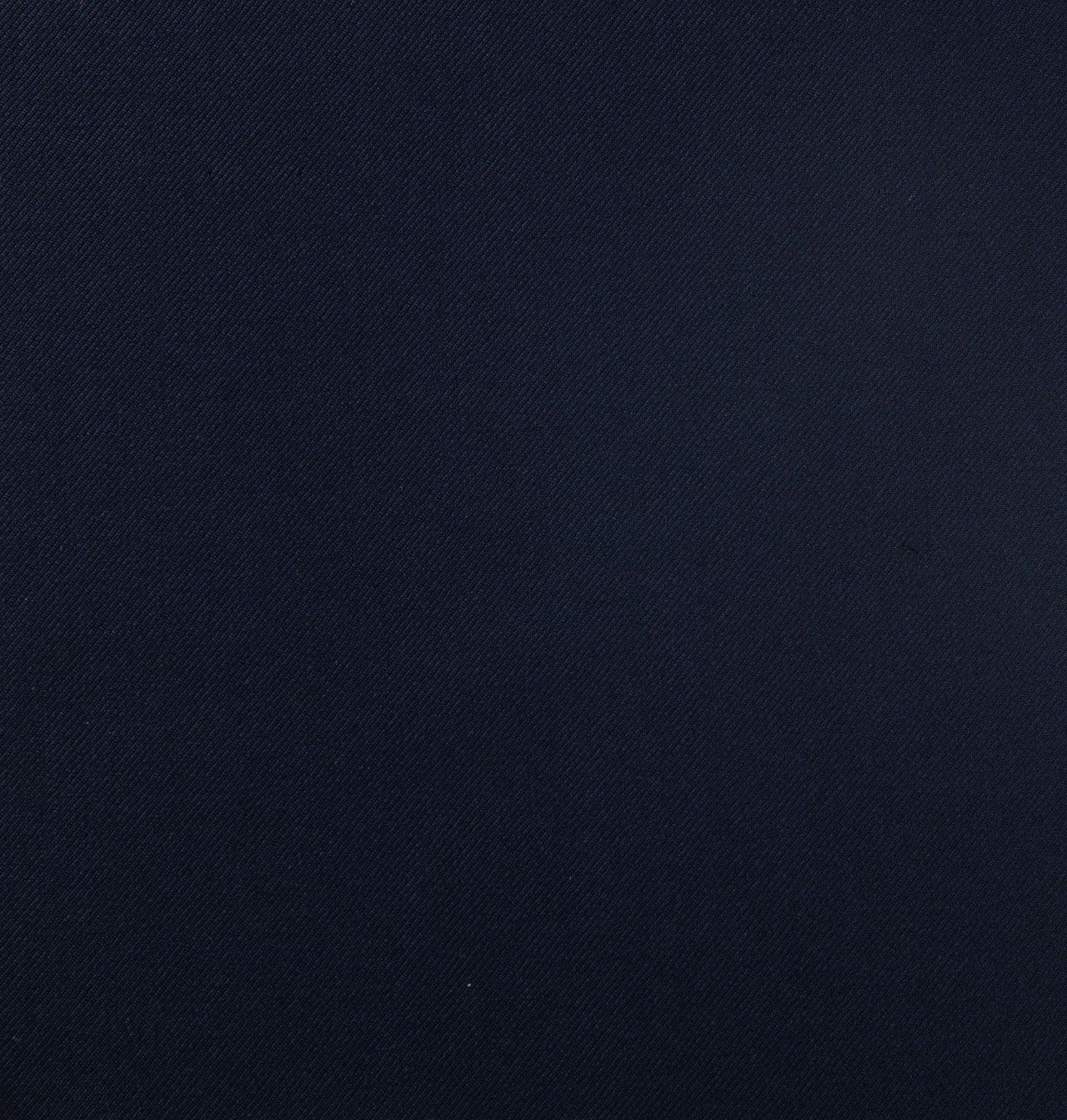 A close up of a dark navy fabric texture