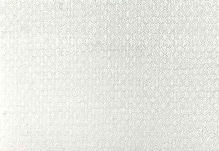 A close up of a piece of white paper with a pattern on it.