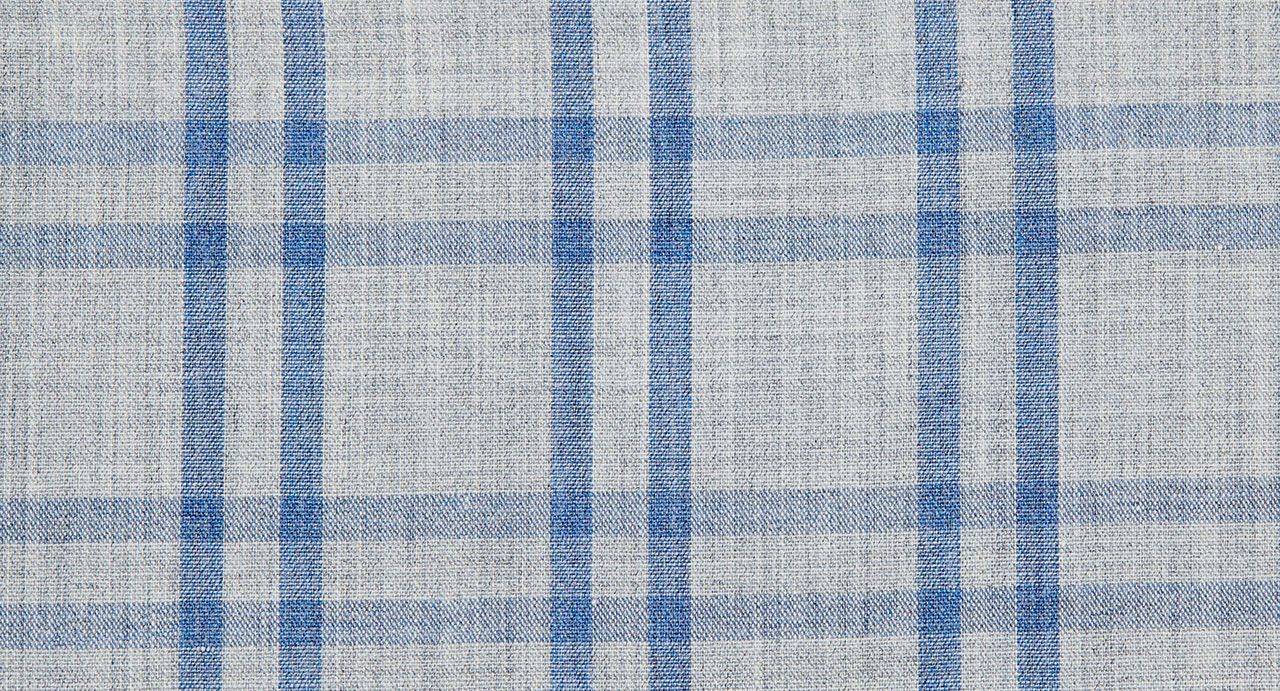 A close up of a blue and white plaid fabric