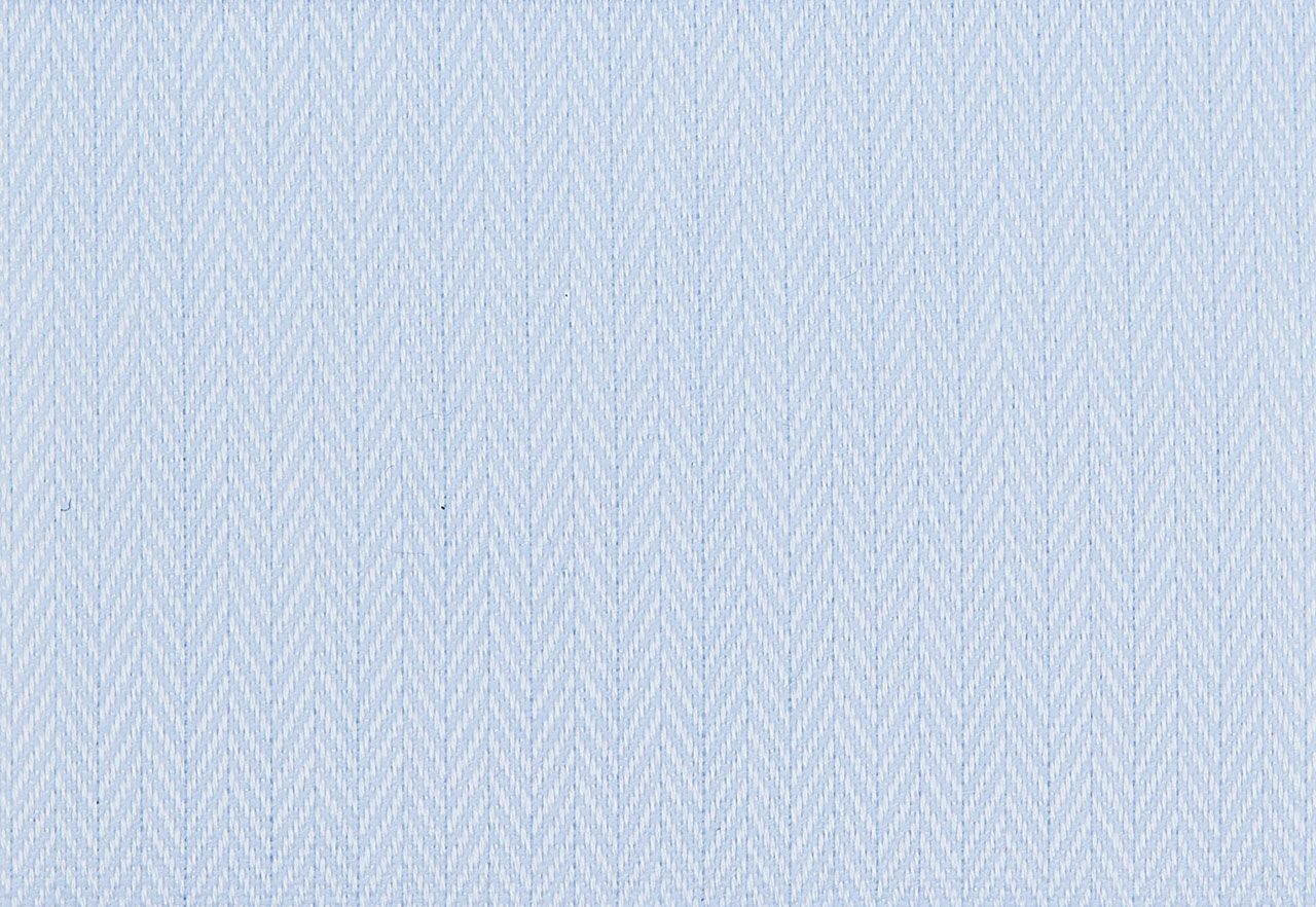 A close up of a light blue paper texture