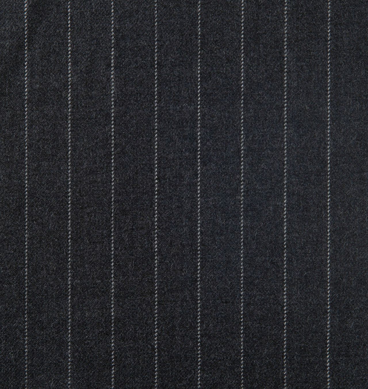 A close up of a black striped fabric with white stripes