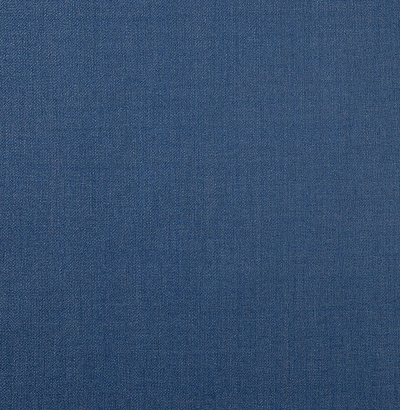 A close up of a dusty blue fabric texture