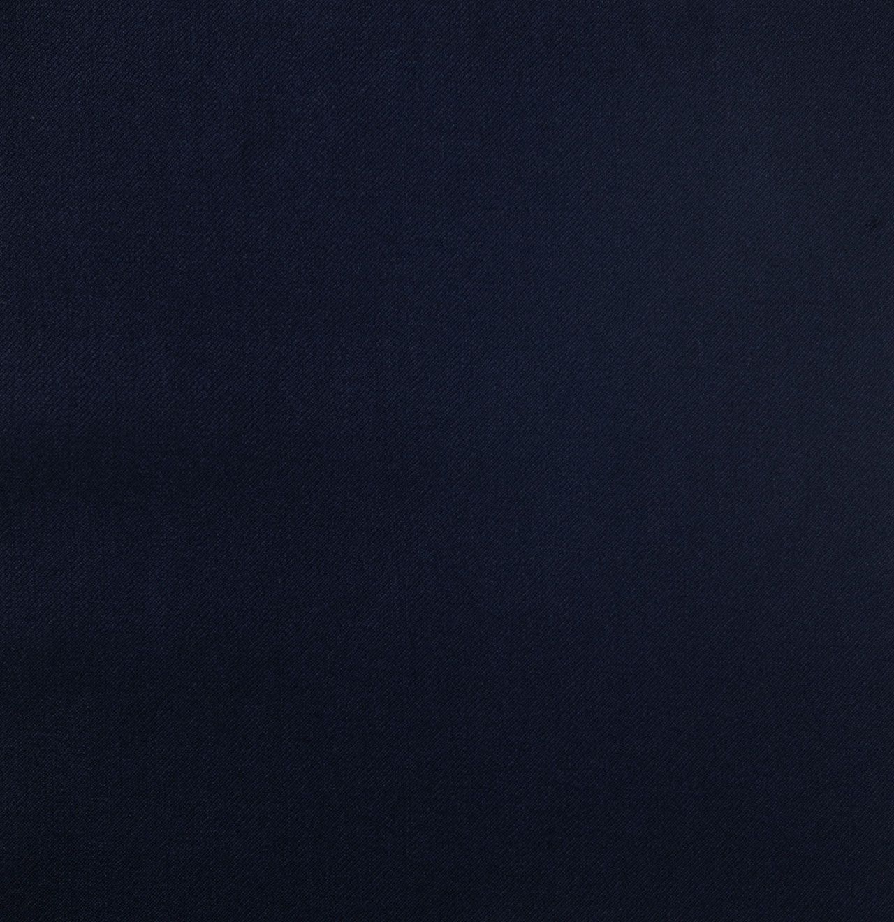 A close up of a dark navy fabric texture