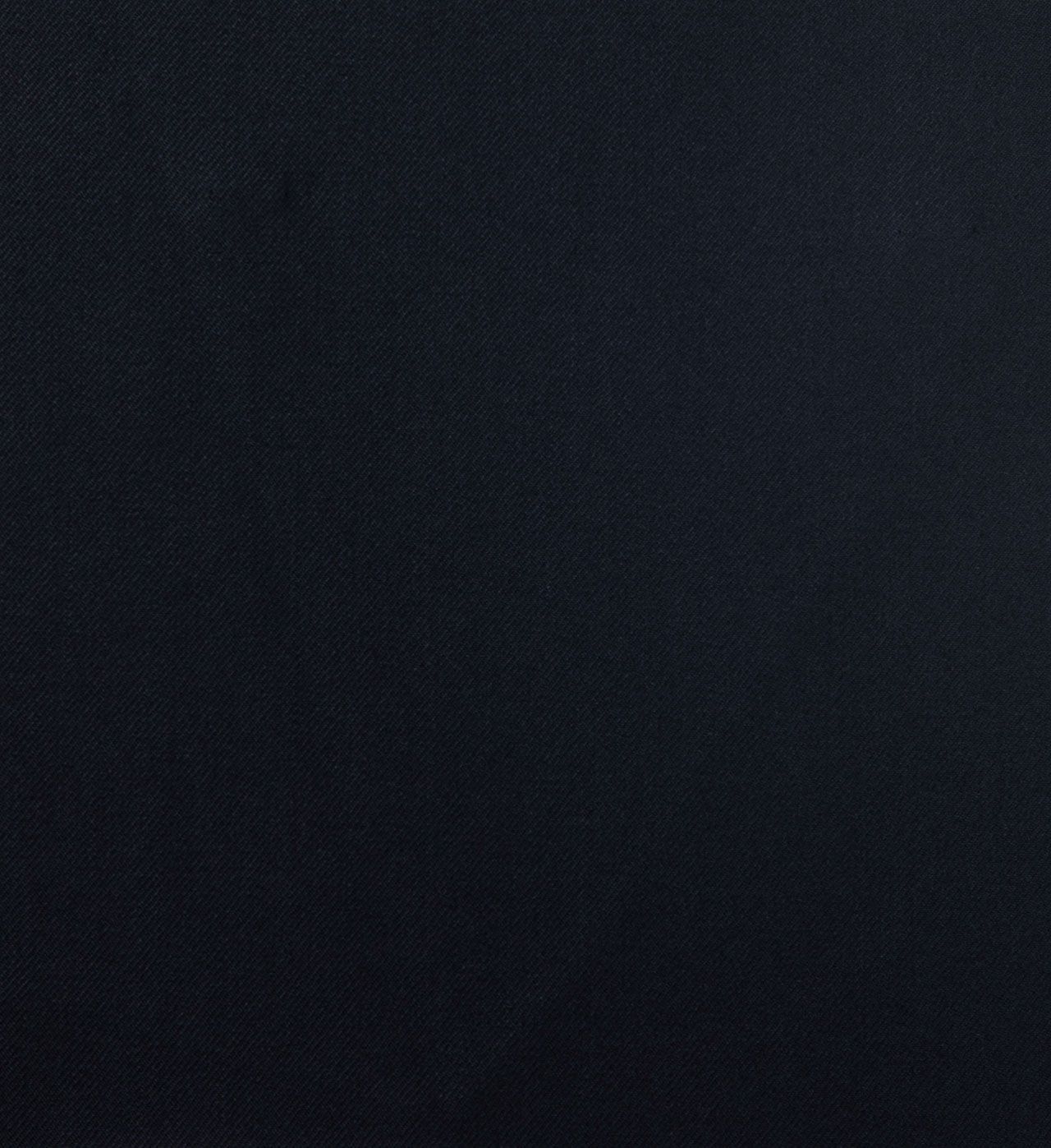 A close up of a black leather texture.